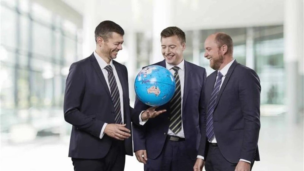 Blue world technology founders with its logo