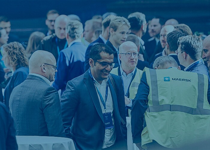 Group of people networking at an stakeholder engagement event