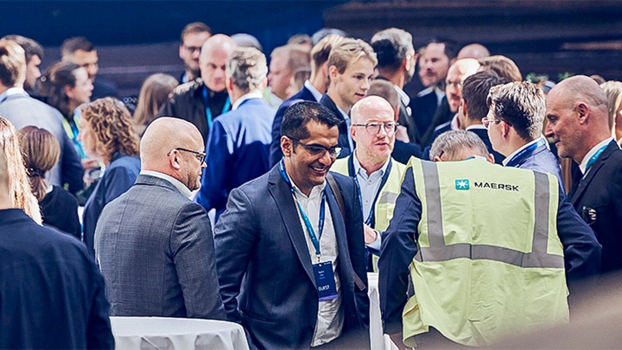 Group of people networking at an stakeholder engagement event