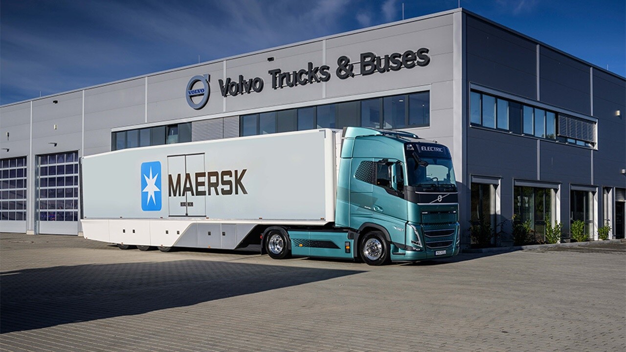 Volvo electric truck with Maersk logo parked outside volvo station