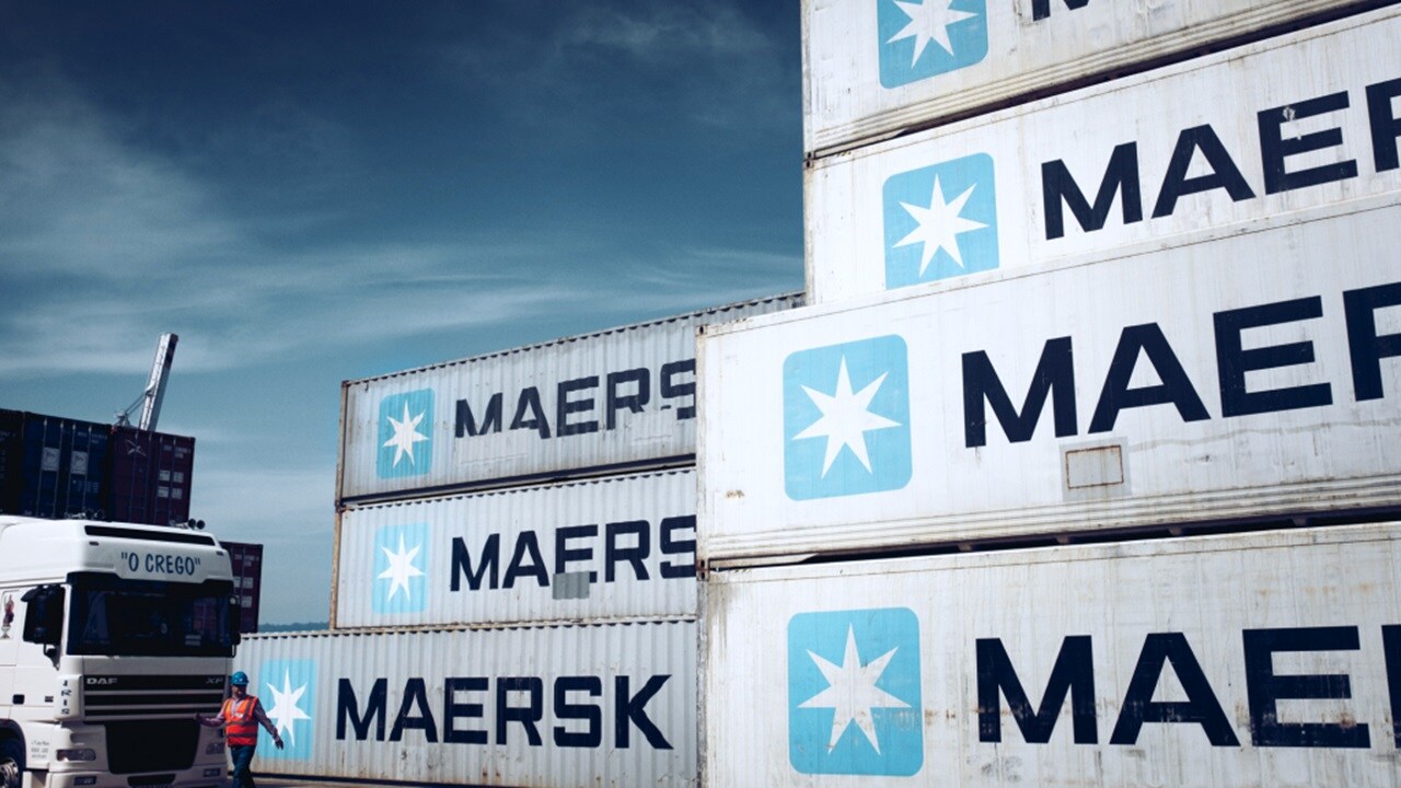 A rail carrying multiple inland cargo containers.