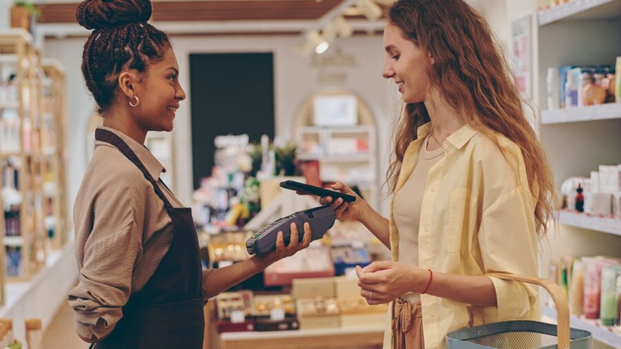 A customer making payment in a shop