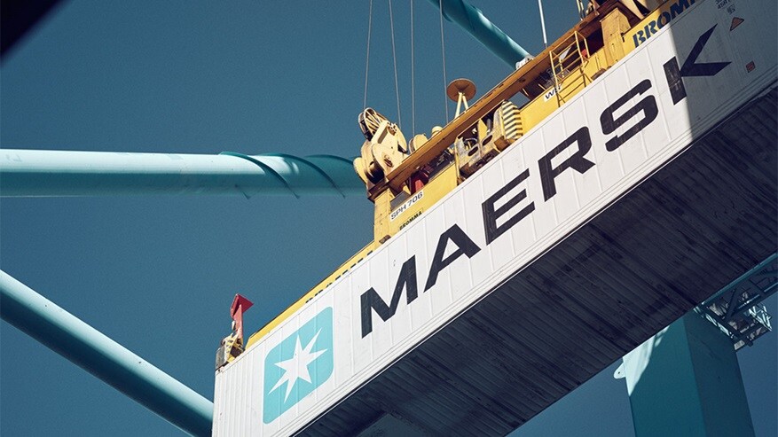 Maersk container being loaded to a truck