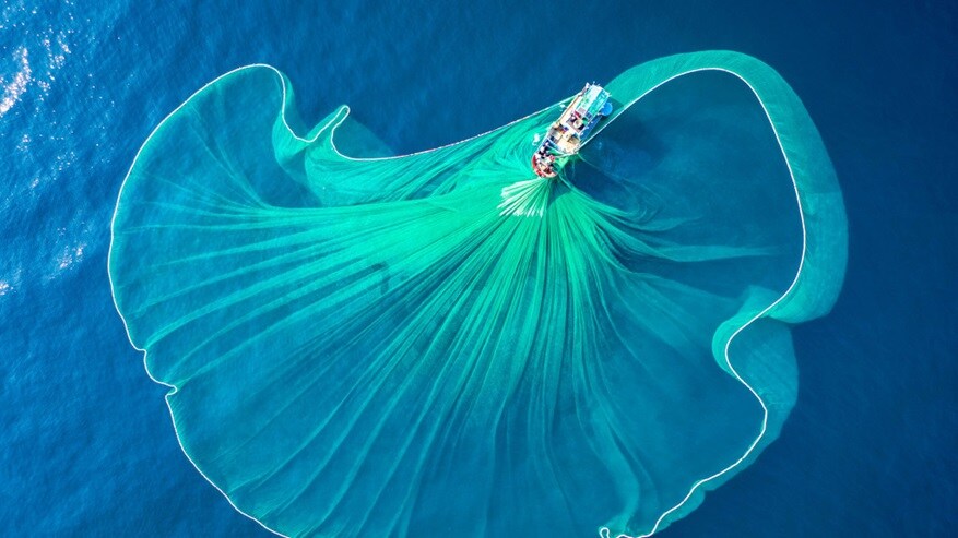 A huge fishing net spread across in the ocean