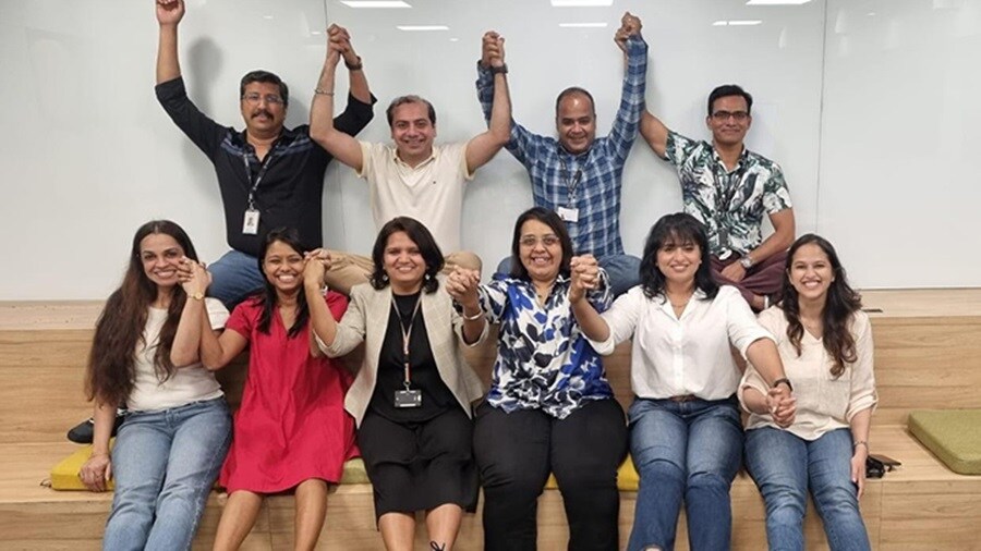 Team raising hands