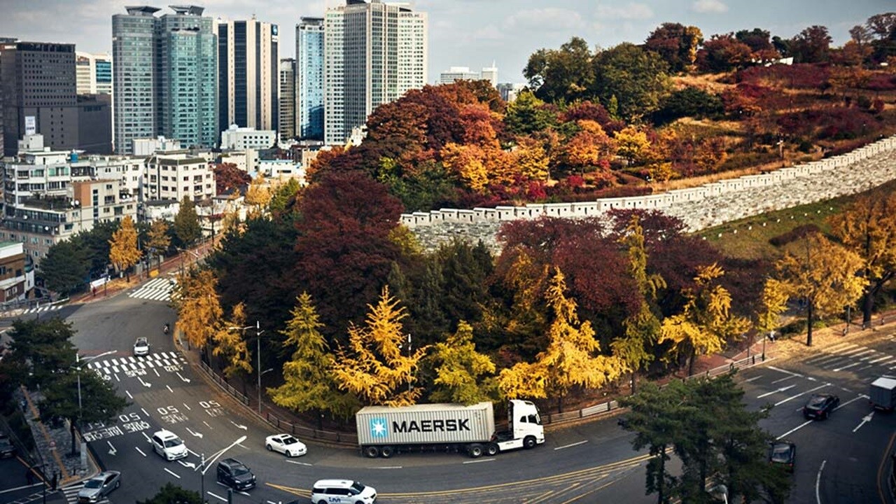 Truck with Maersk container driving in Seoul