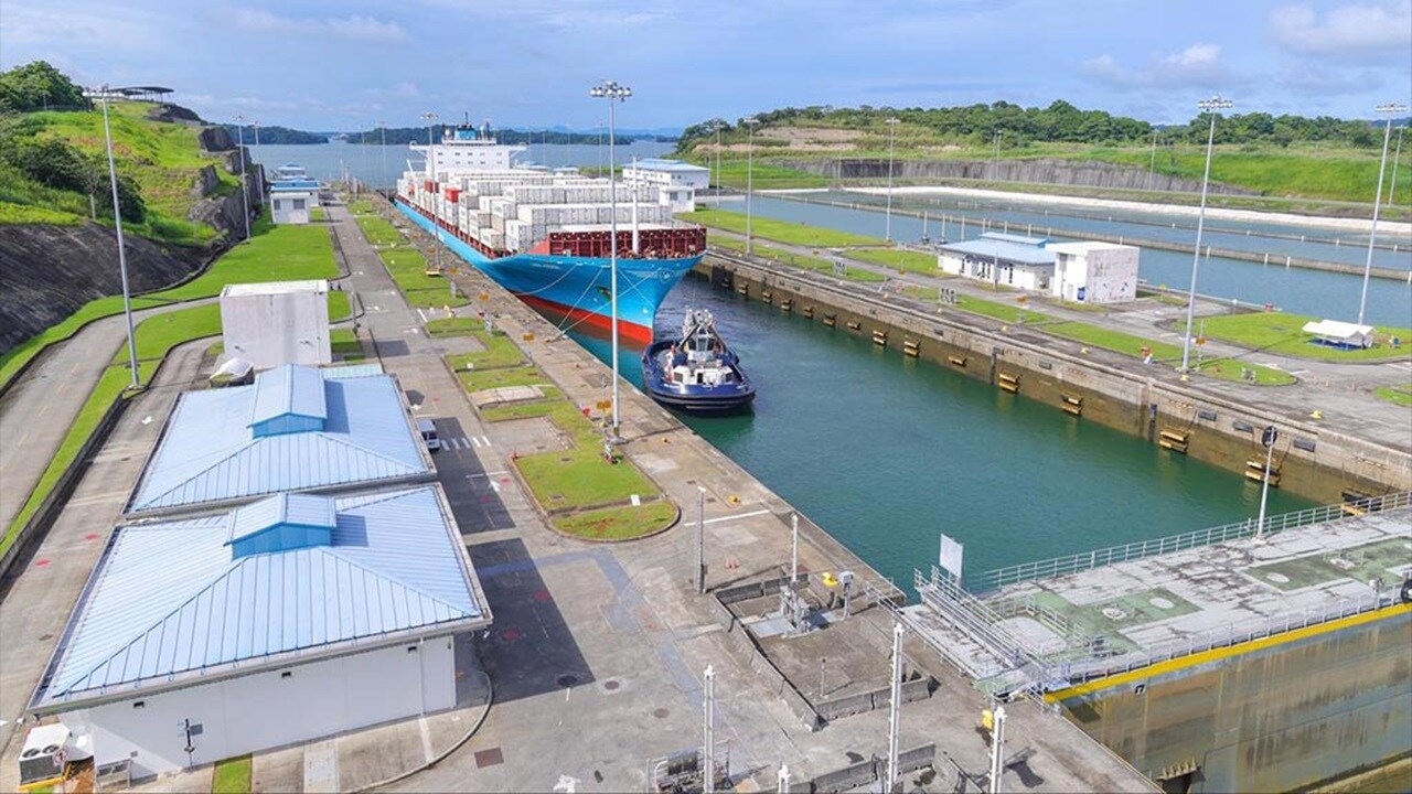 Lars maersk passing through one of the locks at the panama canal