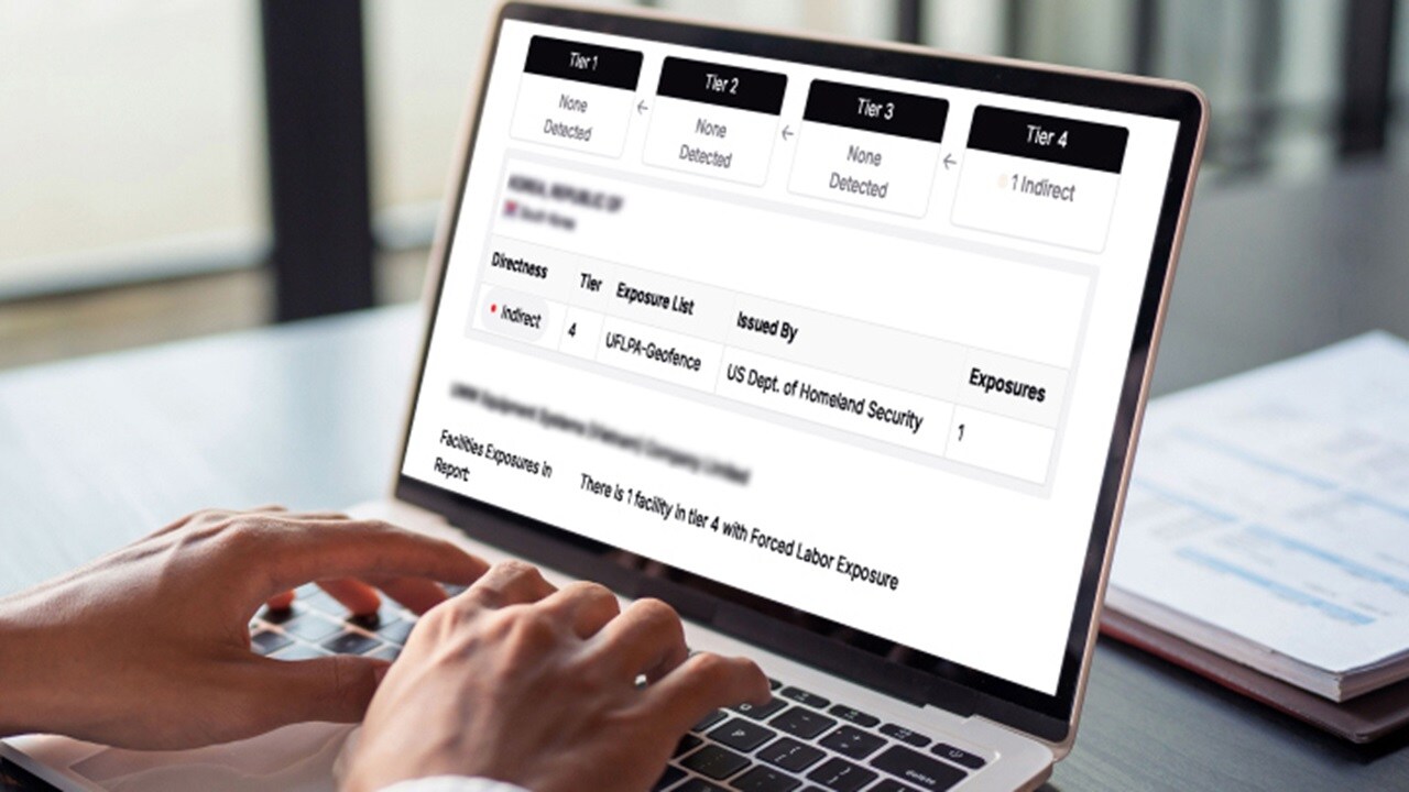 A person engaged with a laptop, where the screen shows the word "order," likely related to a business or personal task.